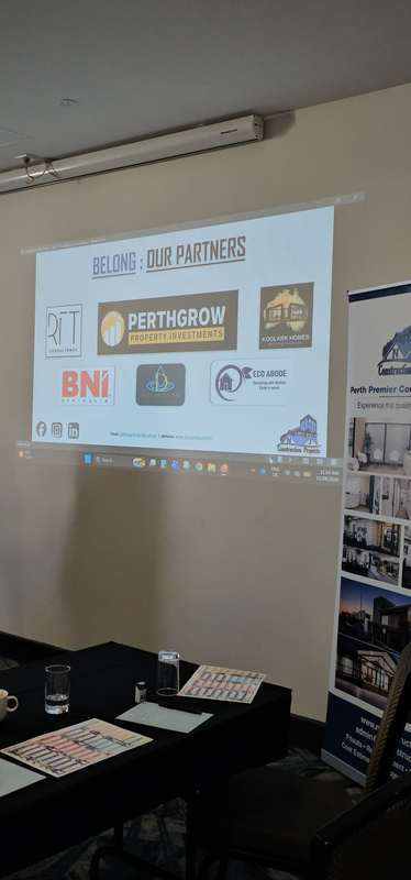 Event presentation slide displaying KOOLARK HOMES among construction-industry partner logos