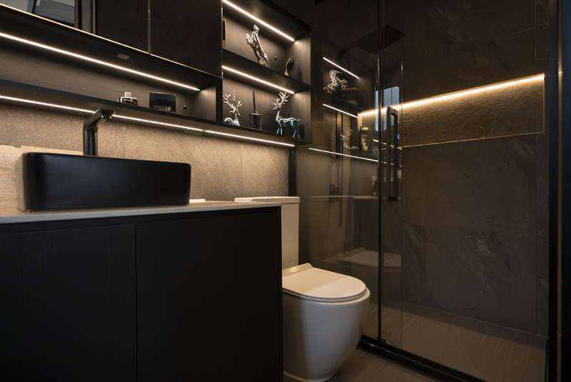 Dark designer bathroom inside a KOOLARK HOMES high-end modular home display in Perth