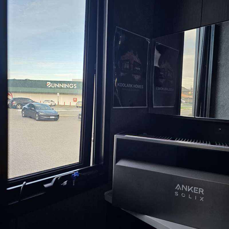 KOOLARK HOMES modular homes display interior at Homebase Subiaco with an Anker SOLIX battery and Bunnings Subiaco visible through the window