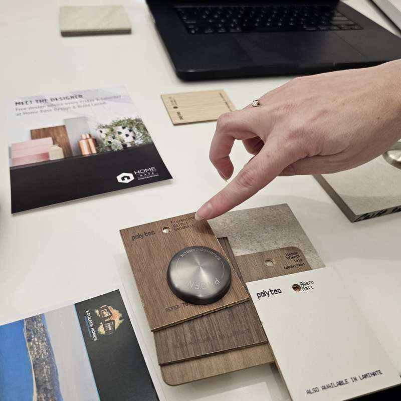 Material sample selection during a KOOLARK HOMES design consultation at Homebase