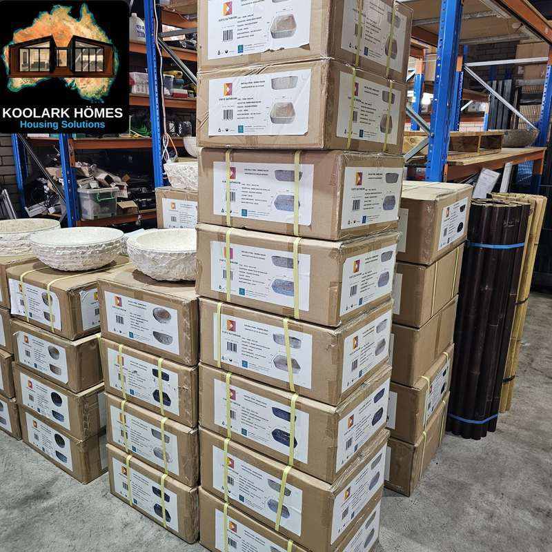 KOOLARK HOMES natural stone basin stock and boxed product selection in warehouse storage
