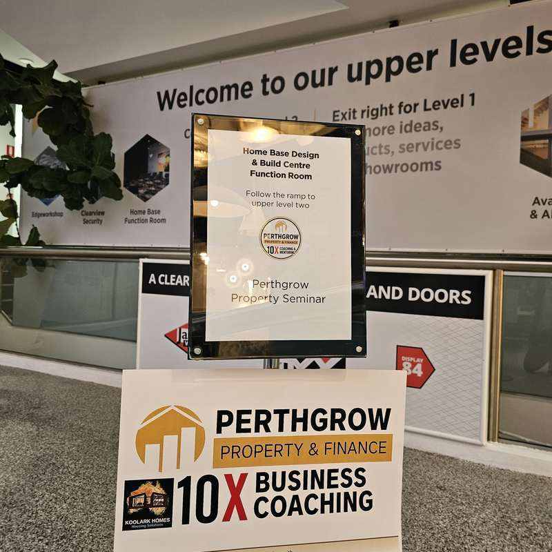 PerthGrow Property and Finance seminar display with KOOLARK HOMES Housing Solutions branding