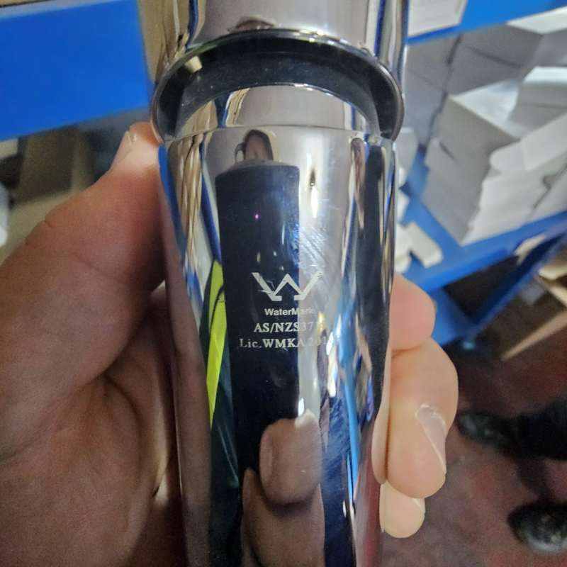 KOOLARK HOMES product-reference image showing a chrome WaterMark-marked mixer held by hand